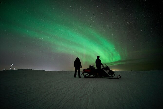 3 Hours Snowmobiling under Auroras and Night Sky - A fire, a tipi, and Finnish sausages