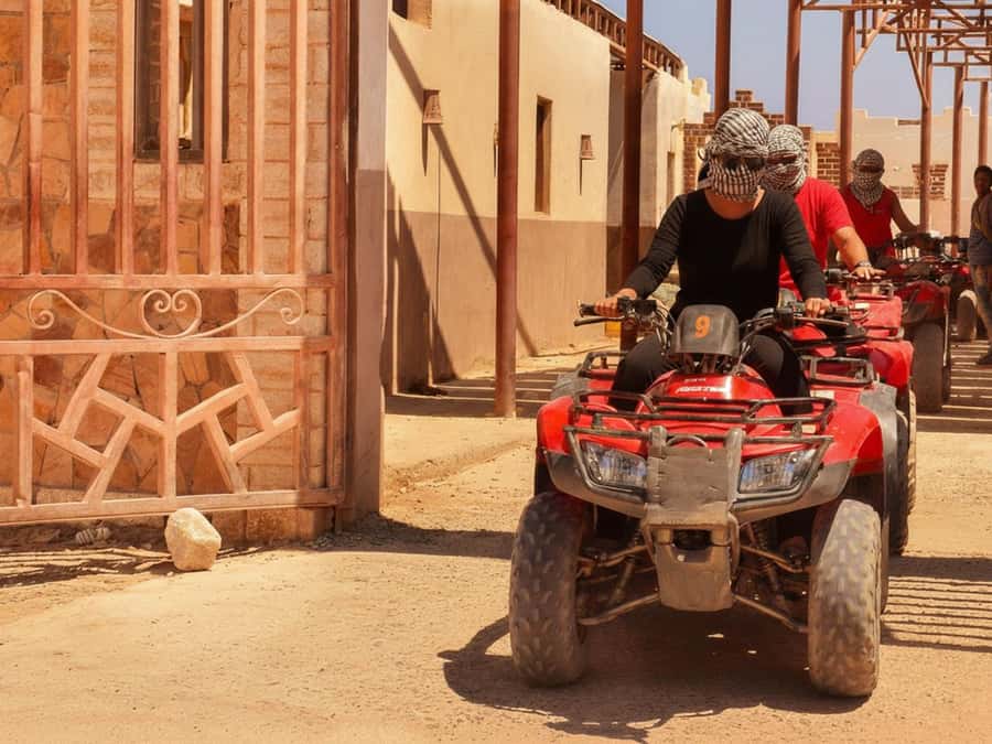 Hurghada: Sunset Quad Bike, Camel w/ Opt Stargazing and BBQ - Hurghada’s desert at sunset, with a quad engine under you