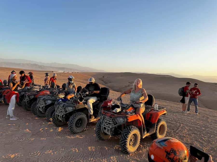 Marrakech: Agafay Desert Camel, Quad Bike & Dinner Show - Sunset camels in blue nomad robes