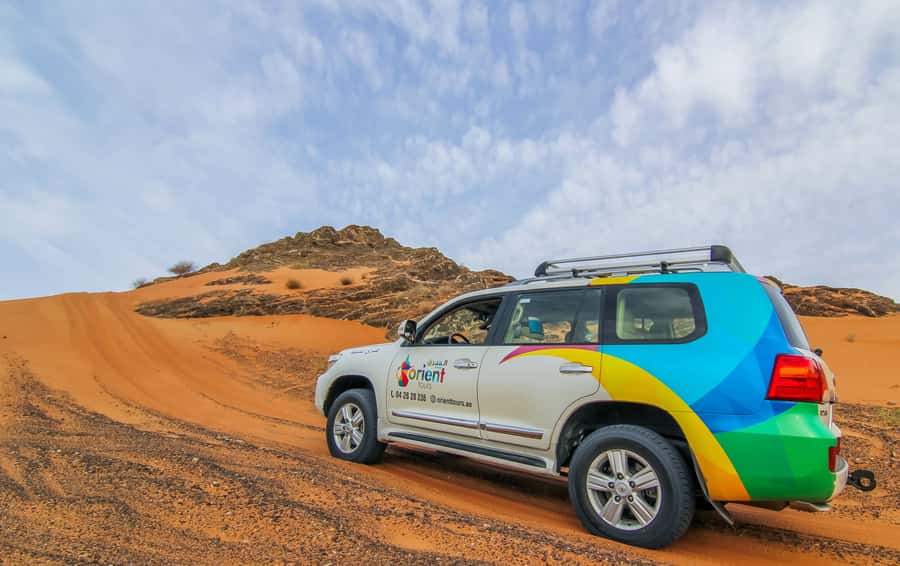 Mleiha Desert Safari with Sandboarding, Stargazing & Dinner - Dune bashing in a compact 20-minute burst