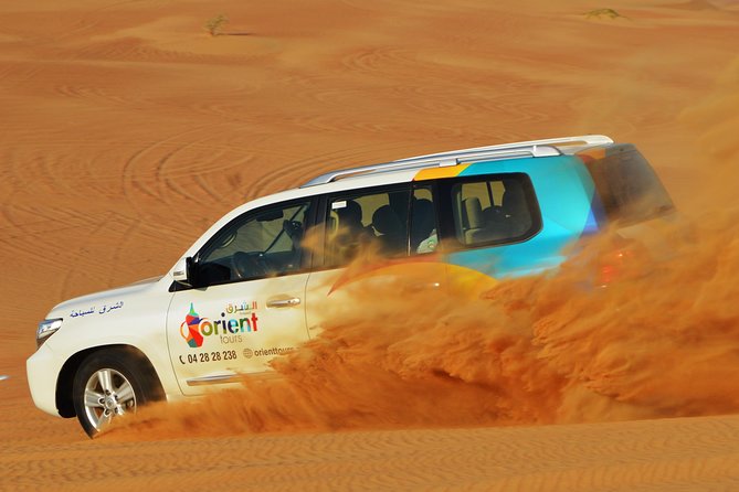 Mleiha Dubai Desert Safari with Stargazing and Dinner - Dune bashing, with a real motion-sickness warning